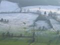 Milde Wintersonne auf Kulturlandschaft in Tradigist